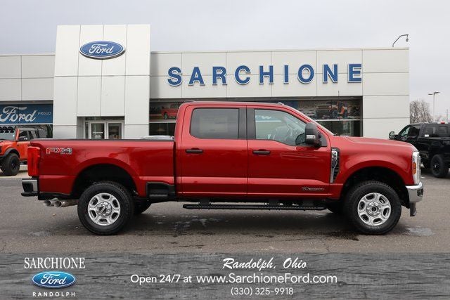 2026 Ford F-350SD XLT in Ruby Red Metallic Tinted Clearcoat — front three-quarter view