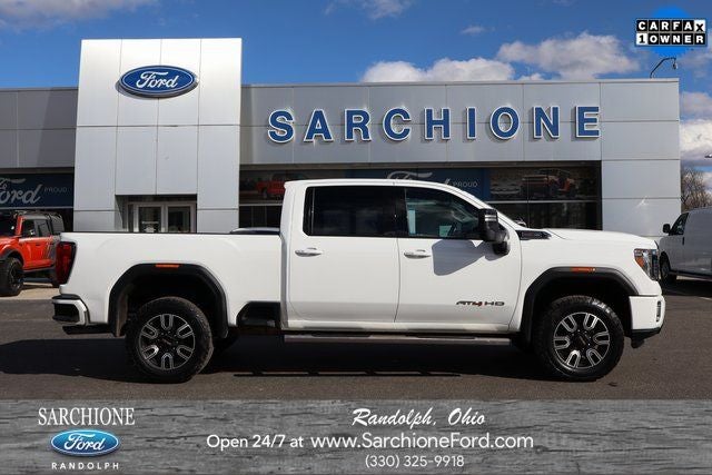 2022 GMC Sierra 2500HD AT4 in Summit White — front three-quarter view