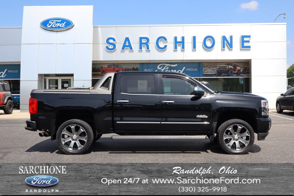 2017 Chevrolet Silverado 1500 High Country in Black — front three-quarter view